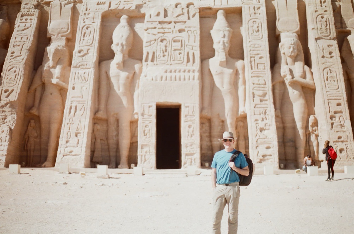 Standing before the Small Temple of Nefertari at Abu Simbel