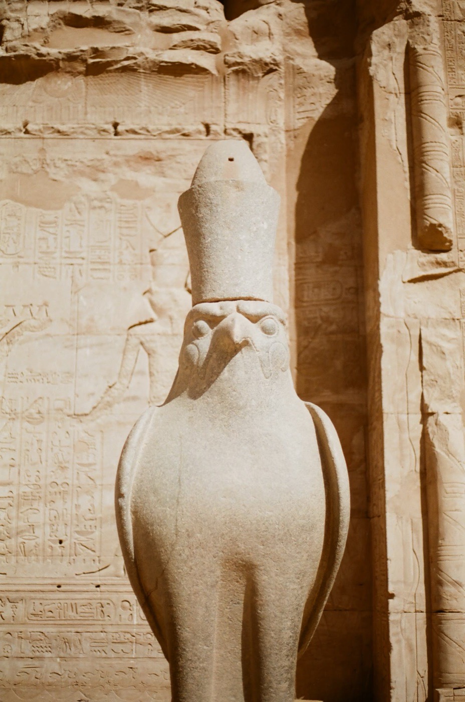 The granite falcon of Horus guarding the temple at Edfu