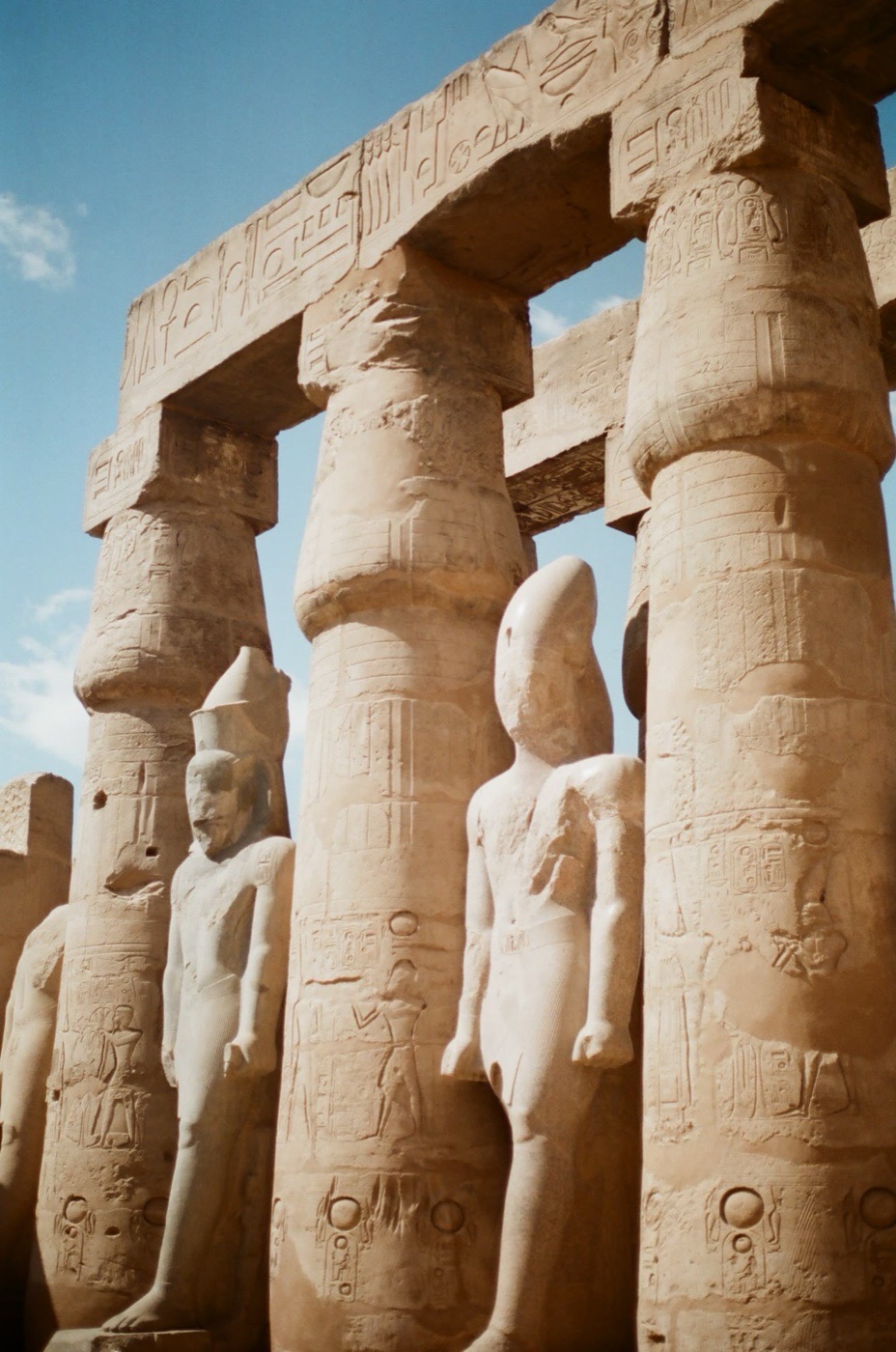 Colossal statues among the columns at Luxor Temple