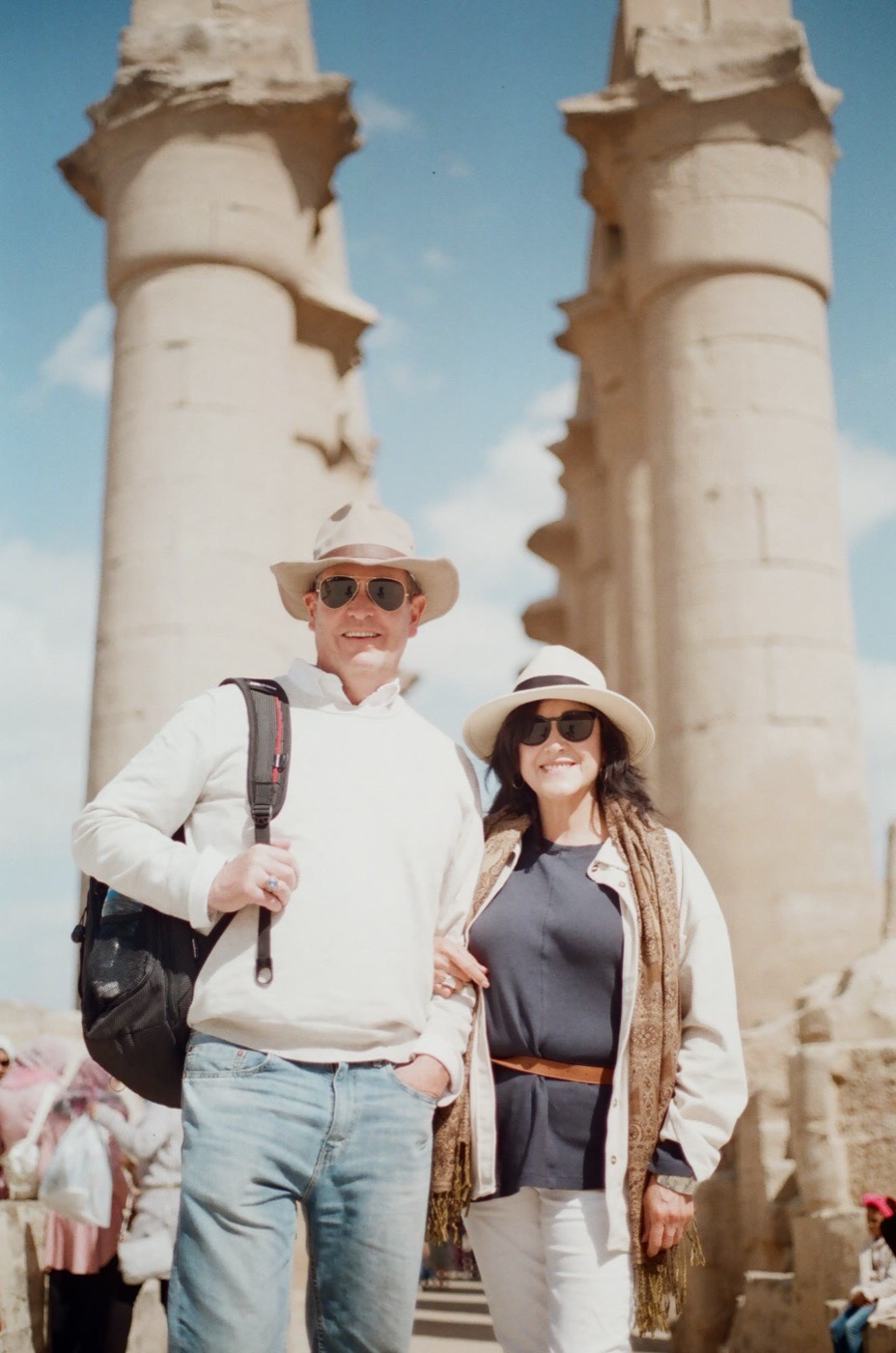Two travelers beneath the columns of an Egyptian temple