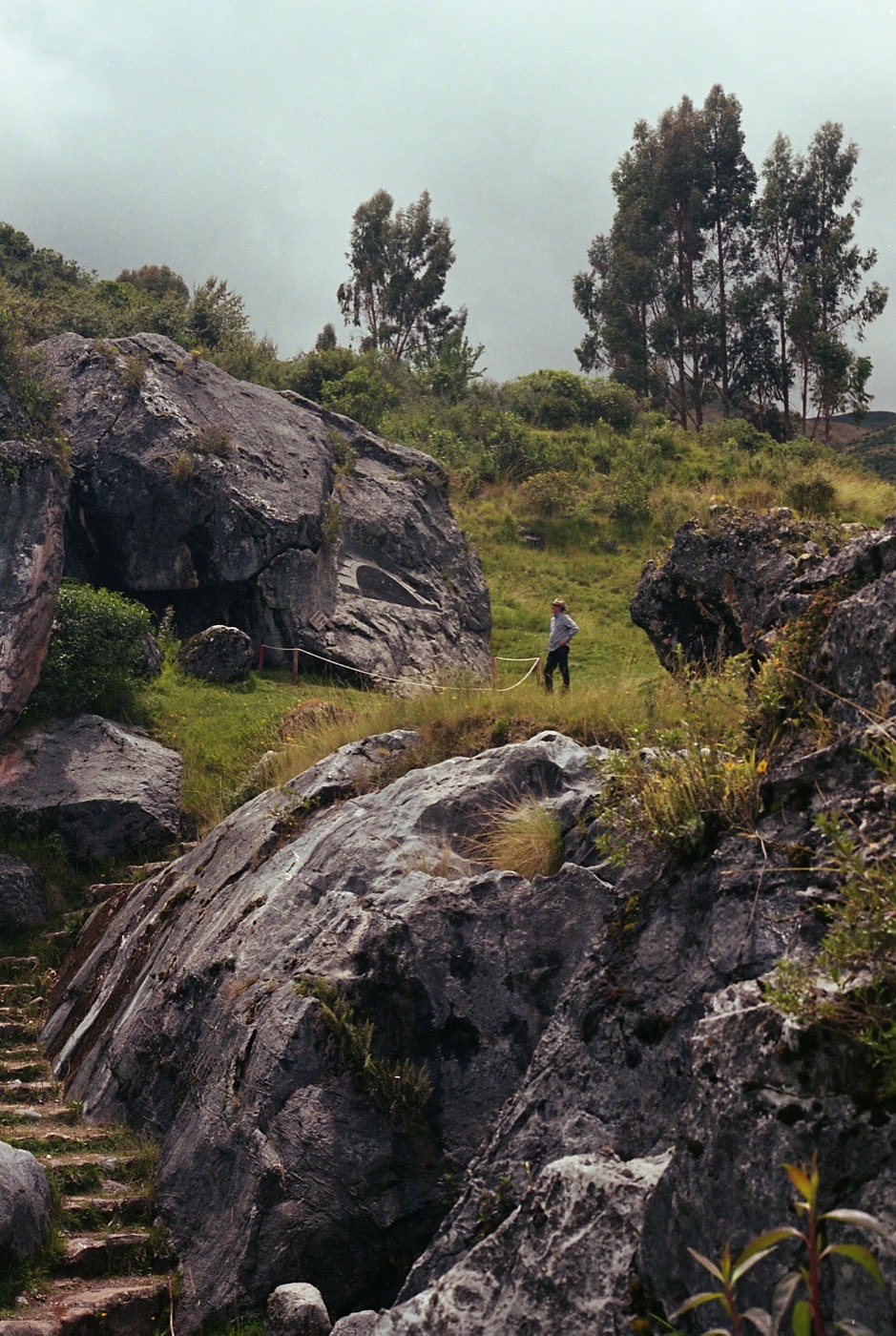 Cut steps threading between boulders on the mountainside