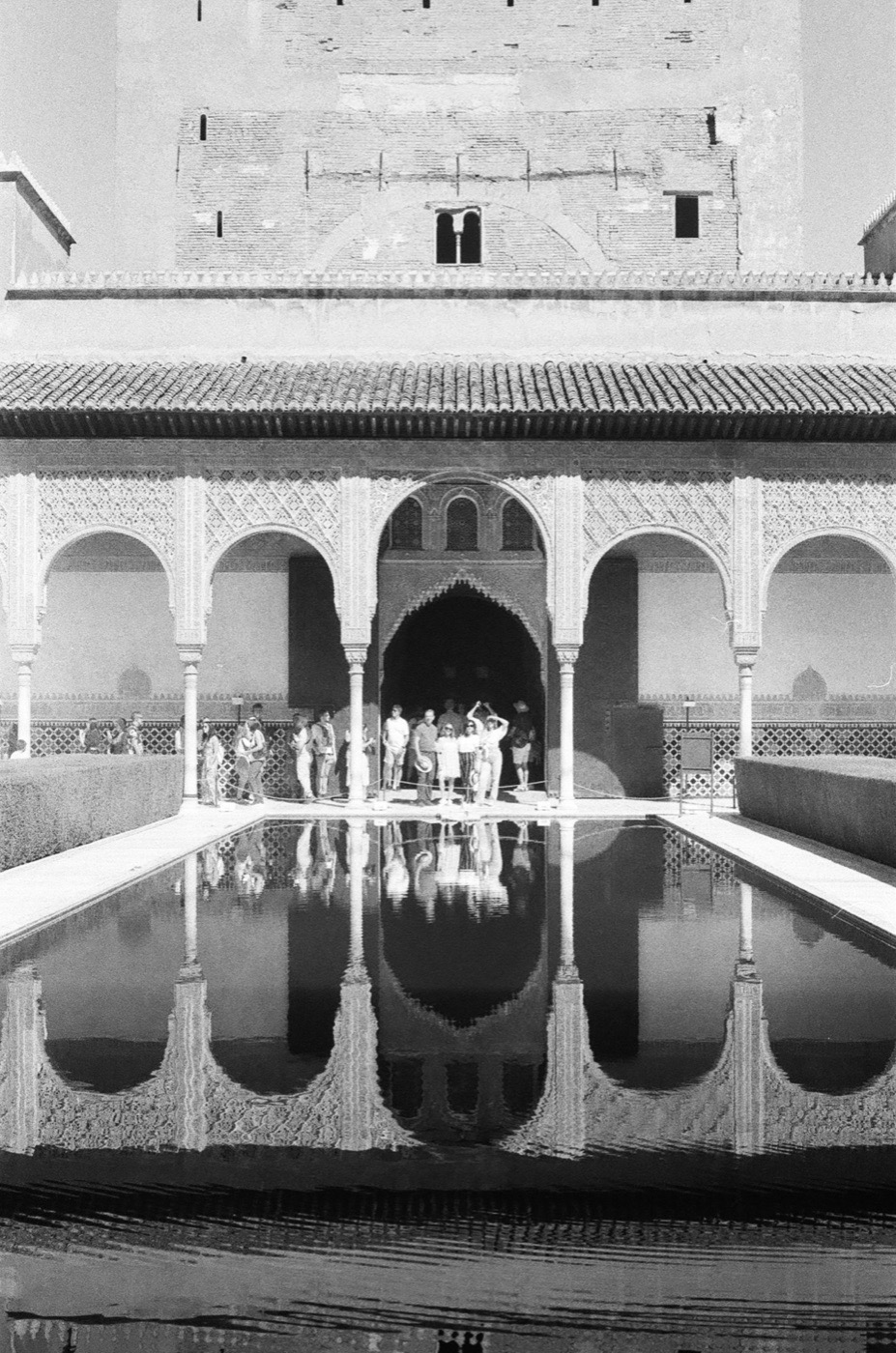 The Court of the Myrtles at the Alhambra mirrored in its pool, shot on black and white film
